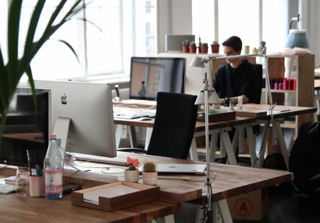 pexels-photo-380769-380769-1 Open-plan office with modern decor and natural lighting, ideal for productivity.